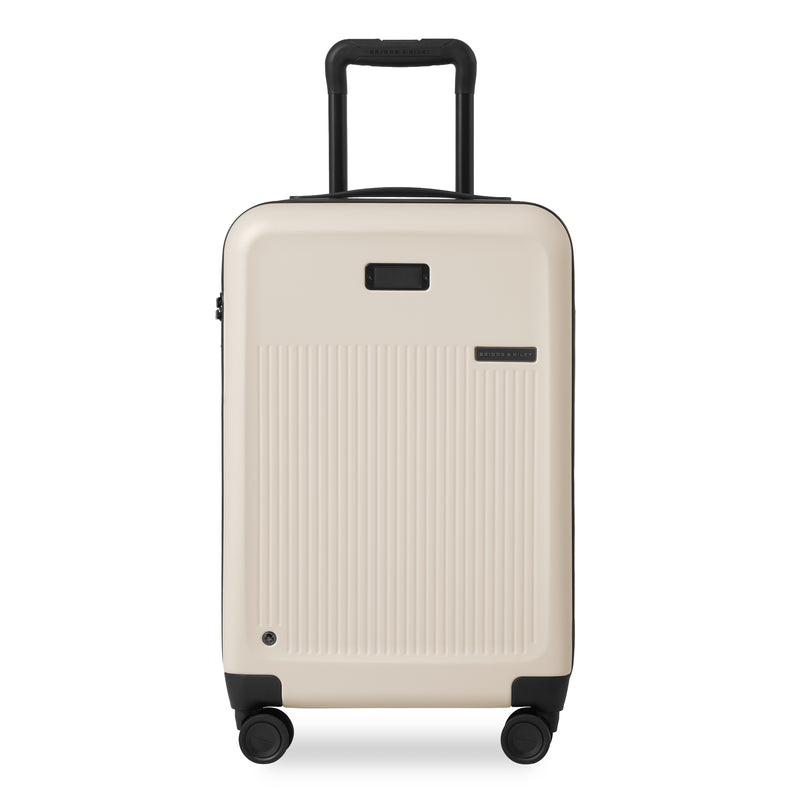 Essential Carry-On Expandable Spinner in Navy, Front View #color_ivory