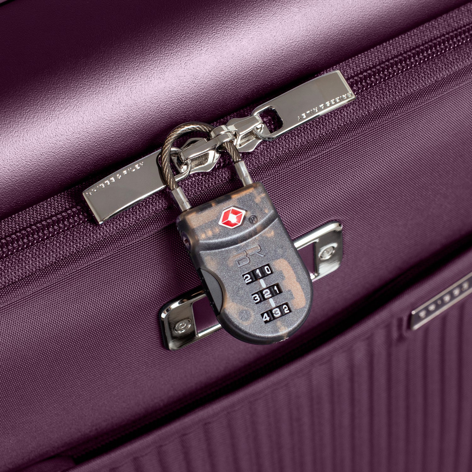 Essential Front Pocket Carry-On Expandable Spinner in Plum