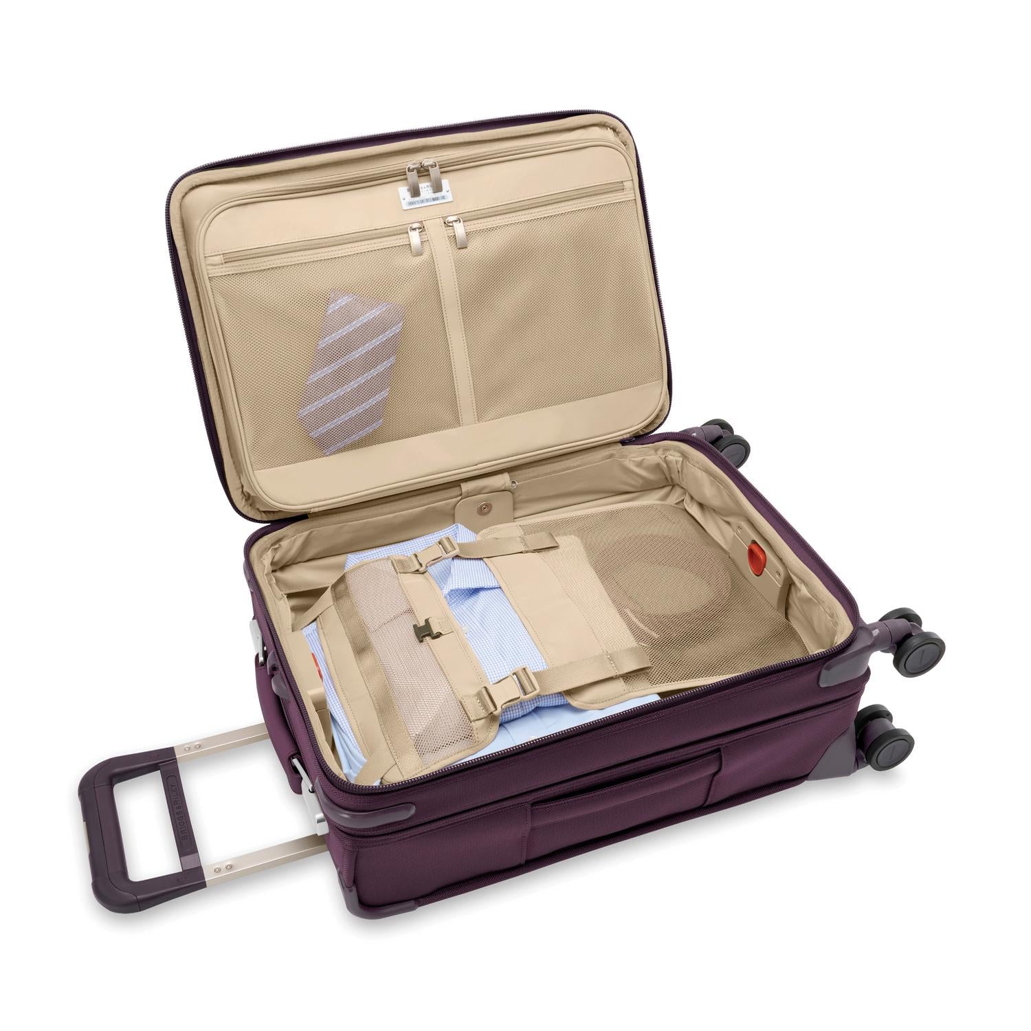 Baseline Essential 22" Carry-On Expandable Spinner Plum Open Packed