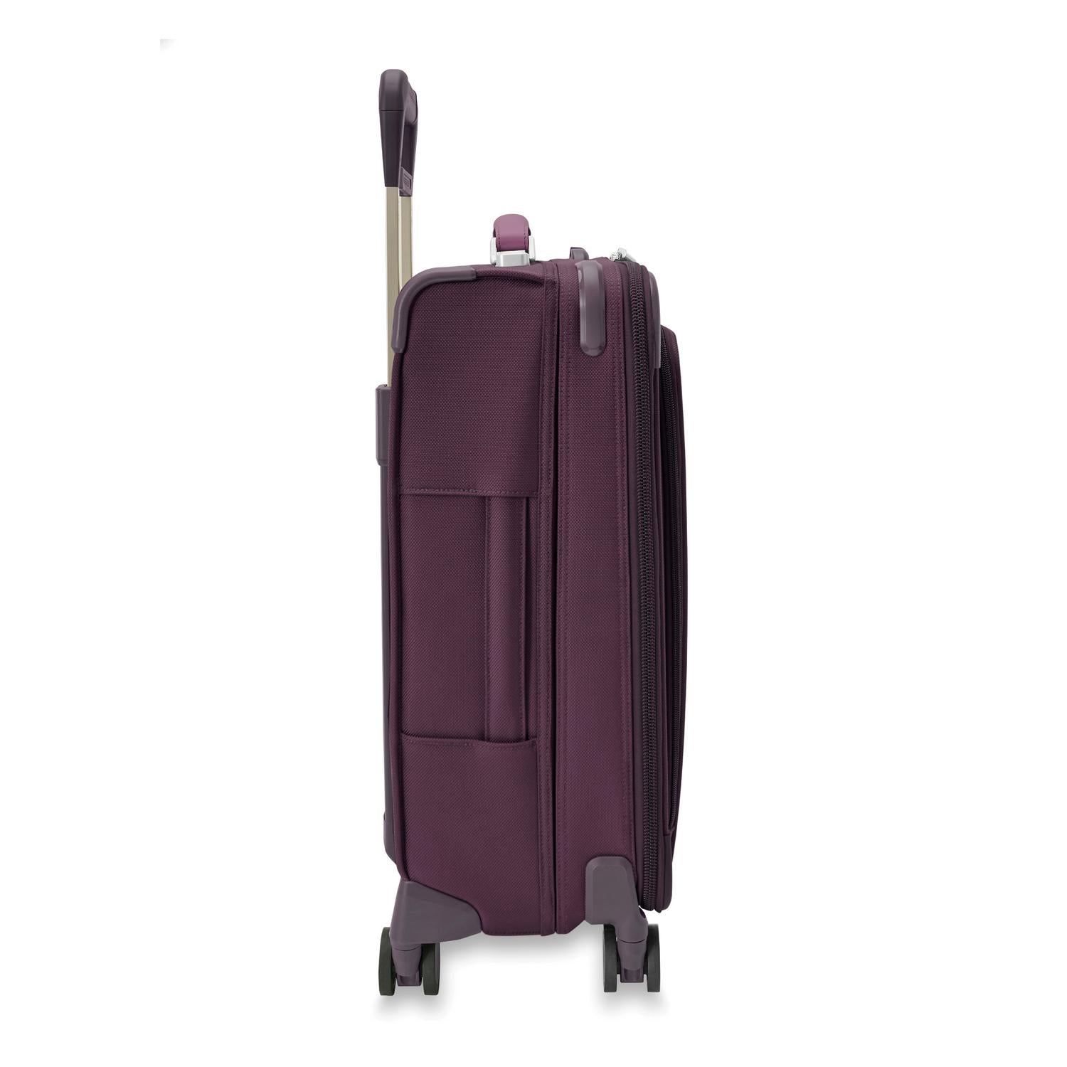Baseline Essential 22" Carry-On Expandable Spinner Plum Side View
